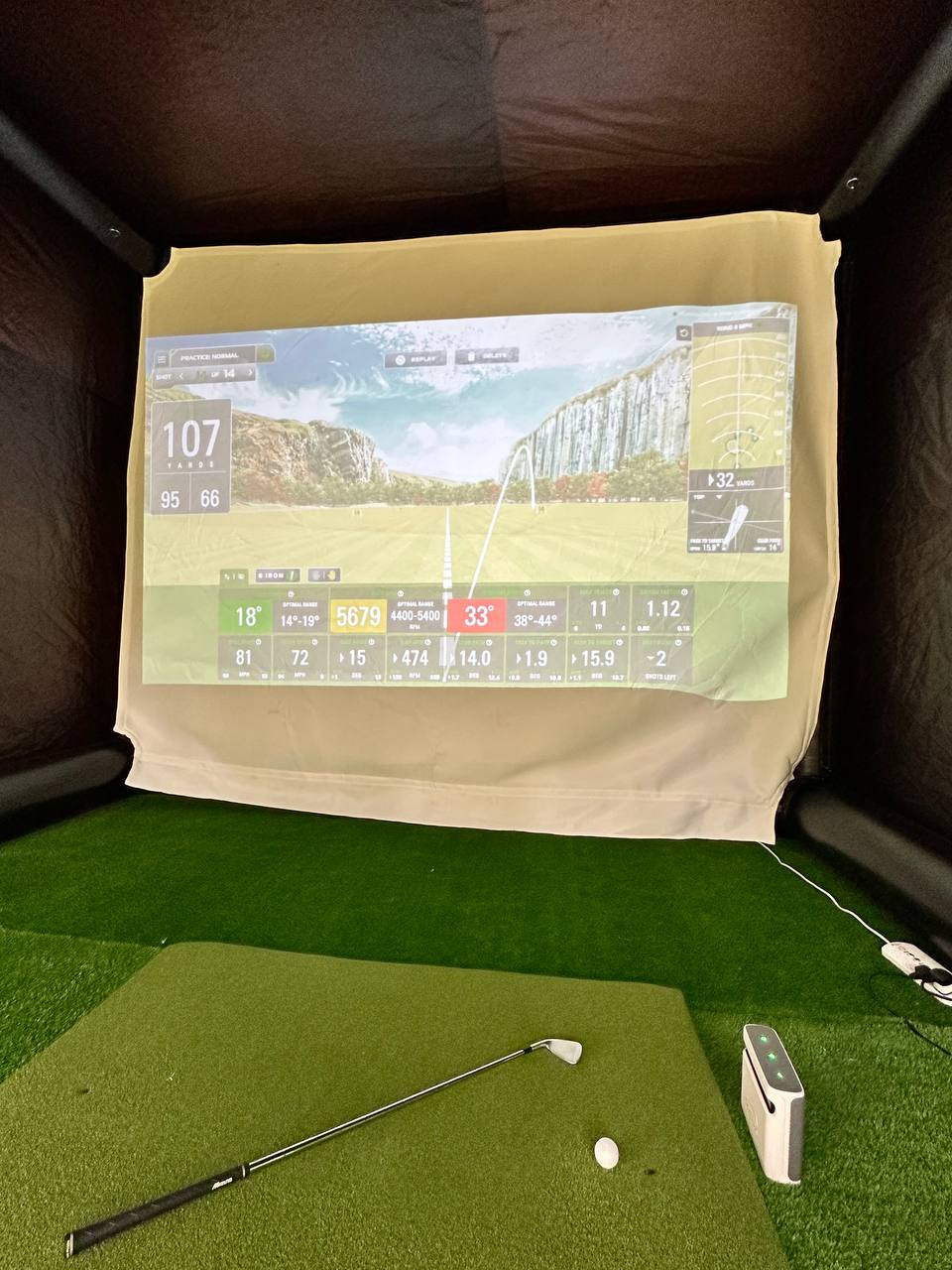 SkyTrak launch monitor and simulator screen showing shot data